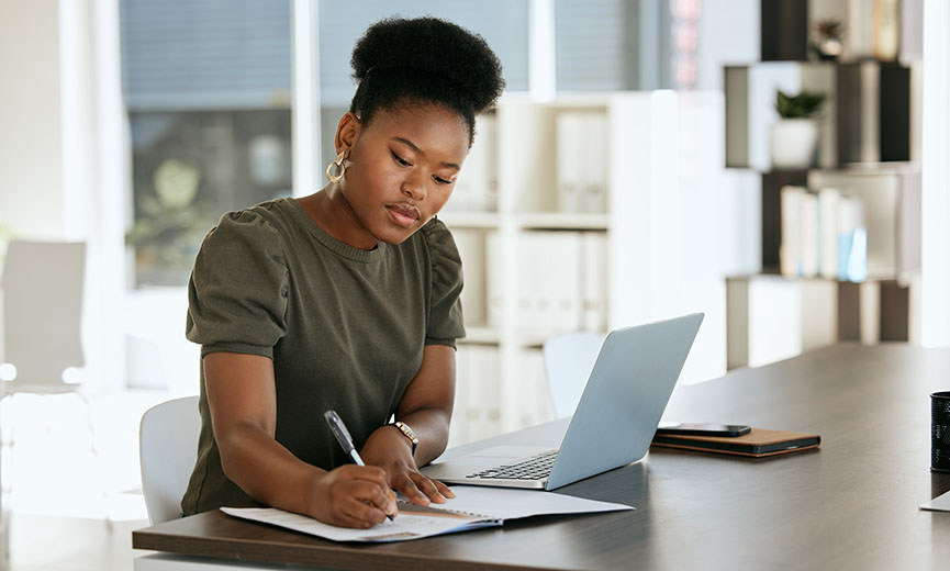 an hr manager using a payroll calendar to budget and plan for compensation expenses